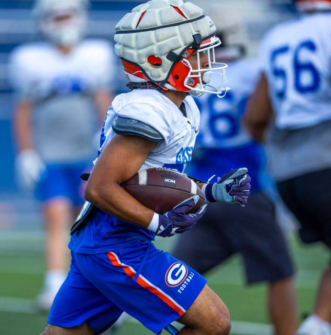 Bishop Gorman running back Myles Norman (24) turns the corner on a run during football practice ...