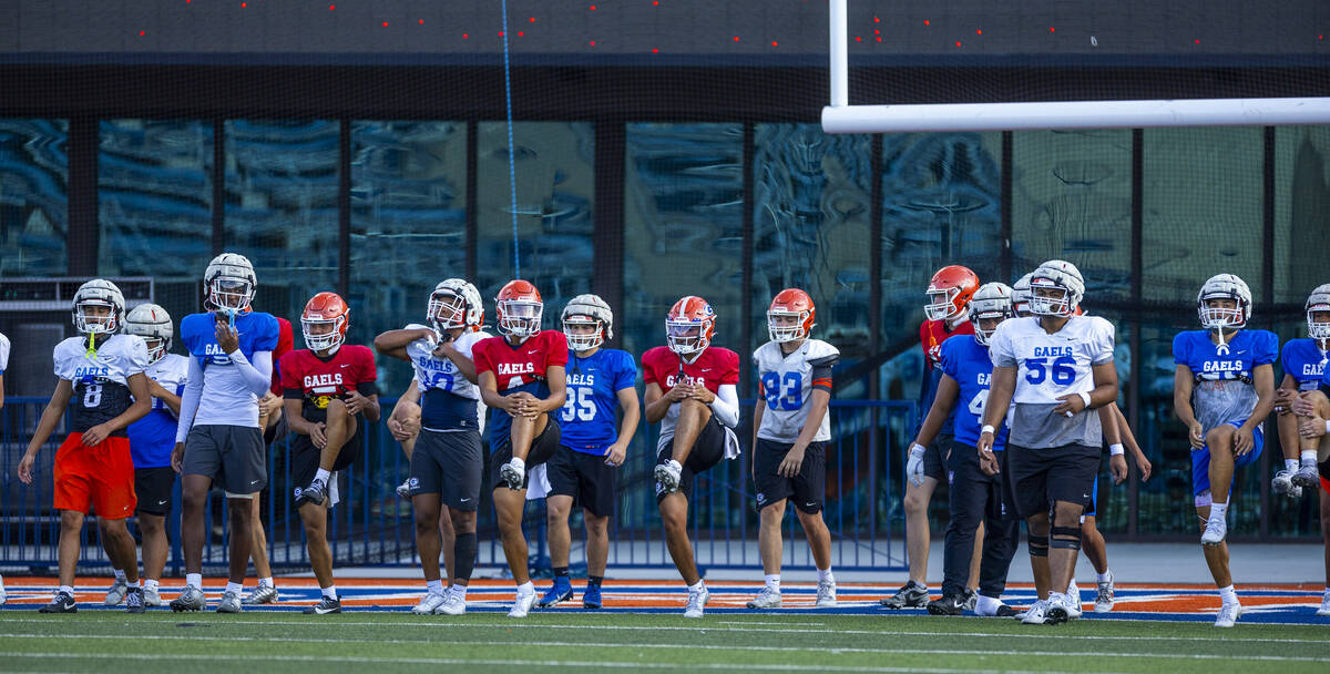 Bishop Gorman players stretch during football practice on Tuesday, Sept. 03, 2024, in Las Vegas ...