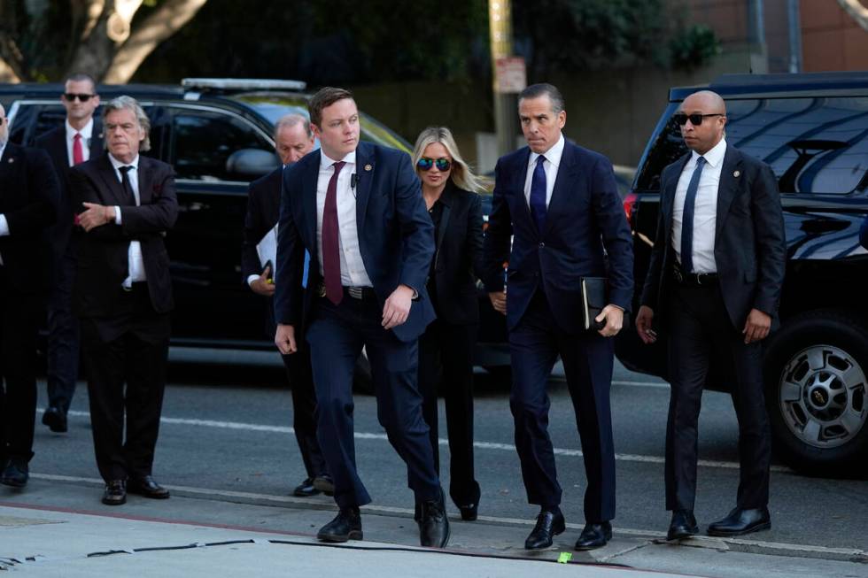 Hunter Biden and his wife, Melissa Cohen Biden, arrive in federal court for jury selection for ...