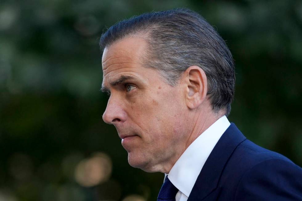 Hunter Biden arrives in federal court for jury selection for his trial on felony tax charges Th ...