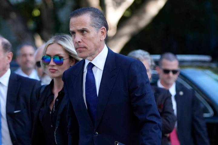 Hunter Biden, right, and his wife, Melissa Cohen Biden, arrive in federal court for jury select ...