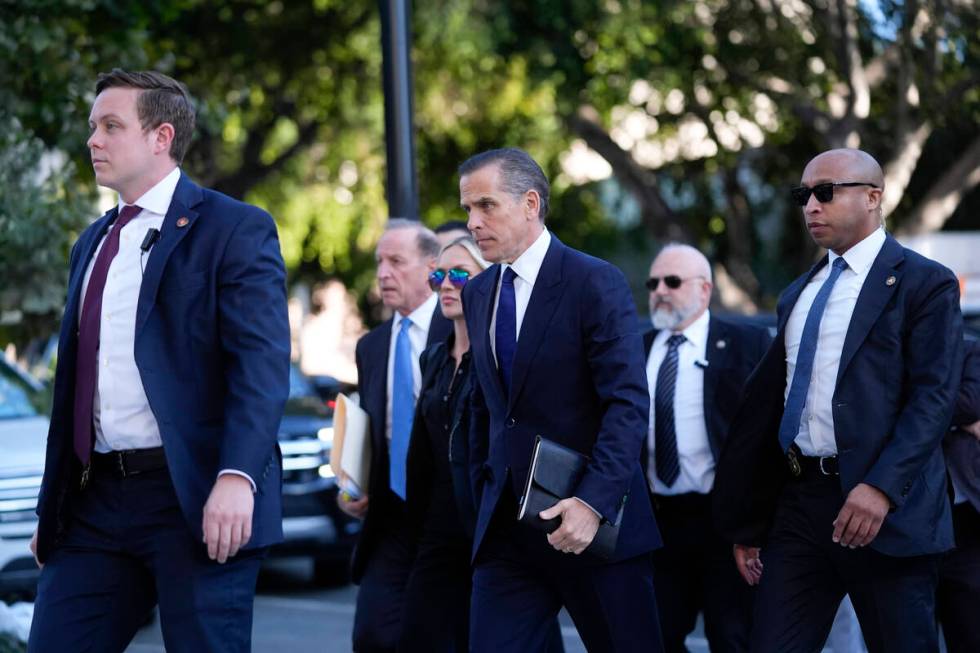 Hunter Biden arrives in federal court for jury selection for his trial on felony tax charges Th ...