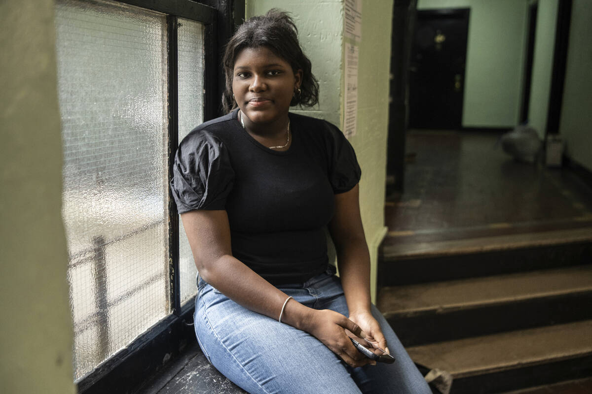 Mia Hall, 14, poses for a portrait in her neighborhood park on Thursday, Aug. 29, 2024, in Bron ...