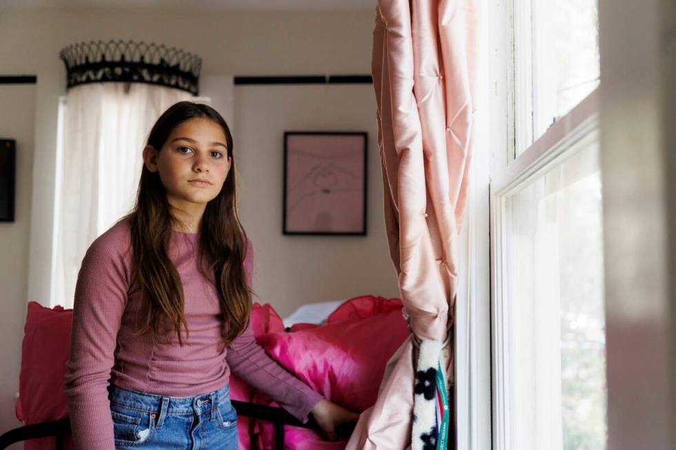 Scarlett Goddard Strahan, 11, poses for a portrait at her home on Tuesday, Aug. 20, 2024, in Sa ...