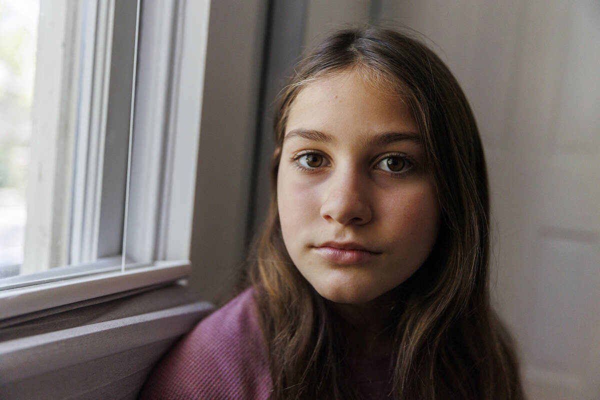 Scarlett Goddard Strahan, 11, poses for a portrait at her home on Tuesday, Aug. 20, 2024, in Sa ...