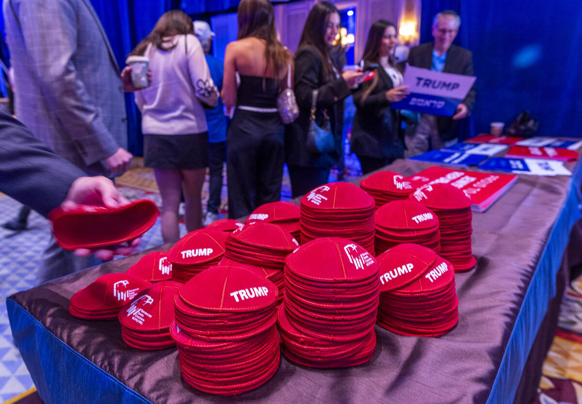 Stacks of yarmulke are available for the taking stamped with Trump and the Republican Jewish Co ...