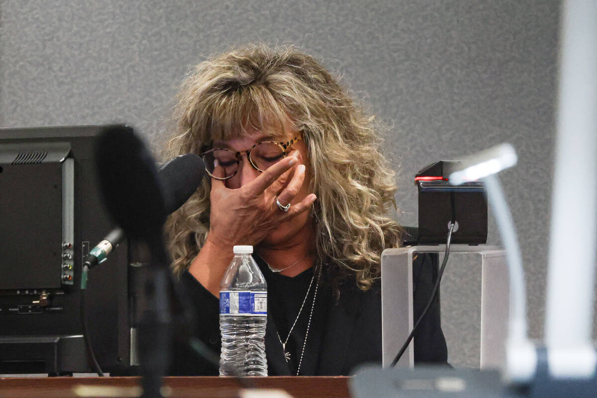 District Judge Mary Kay Holthus becomes emotional as she testifies against Deobra Redden, who f ...