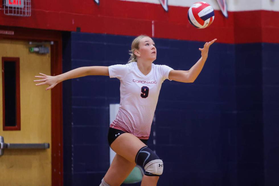 Coronado middle blocker Rachel Purser serves the ball during a volleyball match between Coronad ...