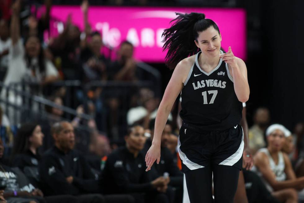 Las Vegas Aces center Megan Gustafson (17) celebrates after scoring during the first half of a ...