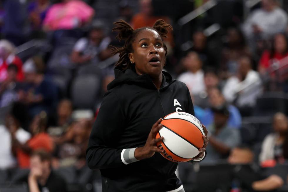 Las Vegas Aces forward Queen Egbo (4) warms up before a WNBA basketball game against the Chicag ...