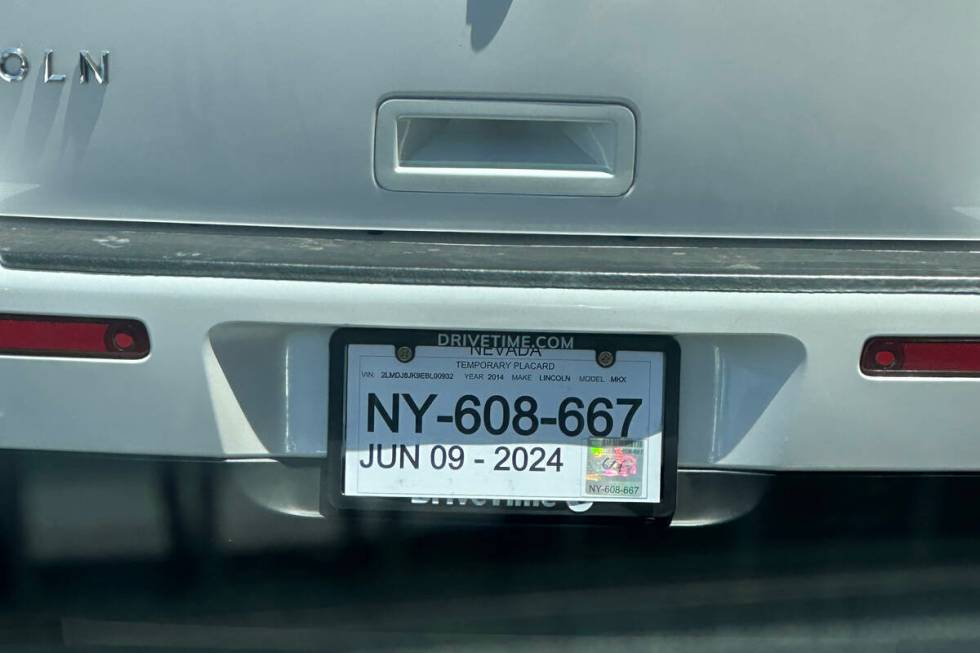 A car with temporary plates which expired June 9, 2024, is seen June 17, 2024, in Las Vegas. (S ...