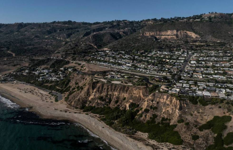 An aerial view shows a neighborhood affected by ongoing landslides in Rancho Palos Verdes, Cali ...