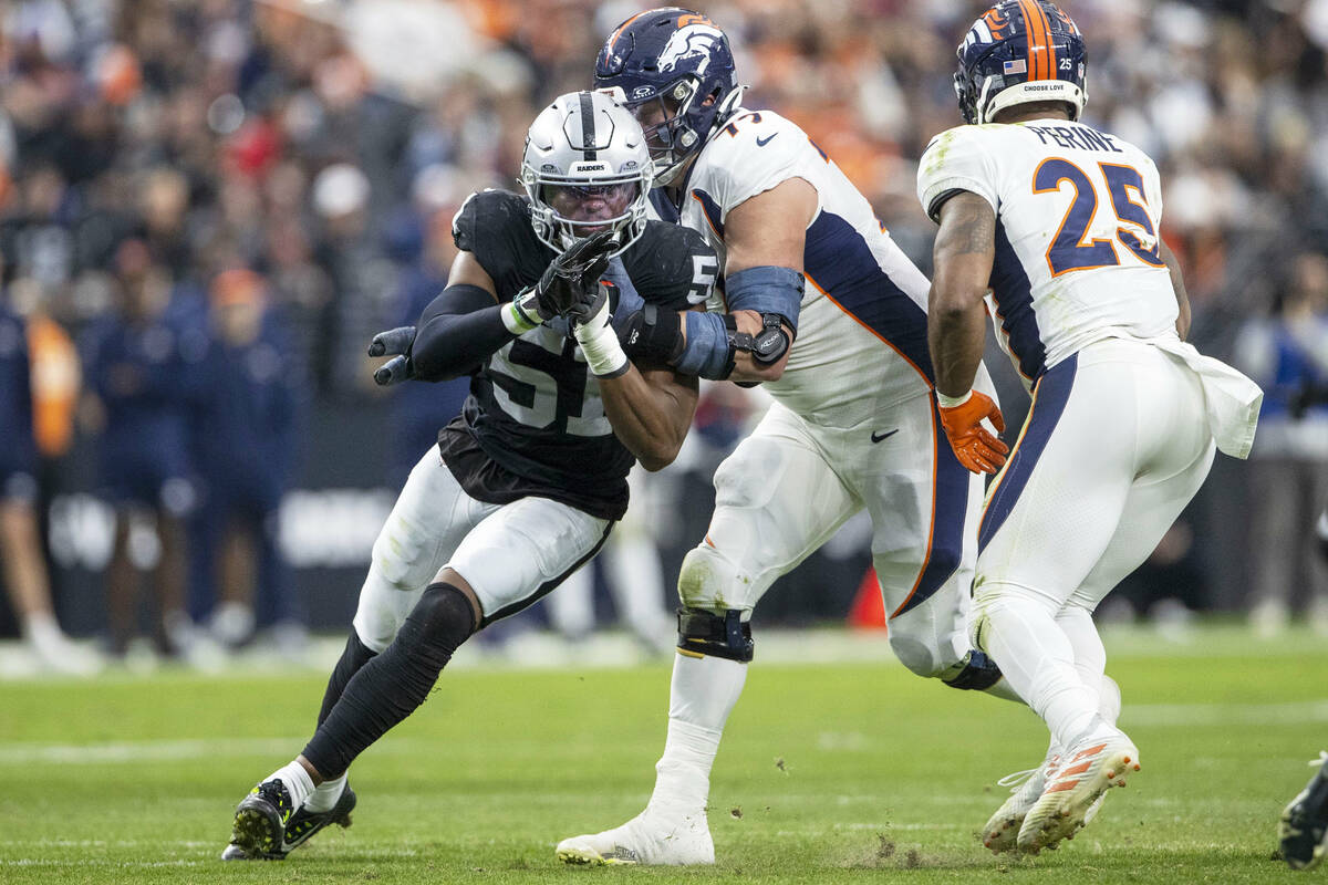 Raiders defensive end Malcolm Koonce (51) works past Denver Broncos guard Quinn Meinerz (77) as ...