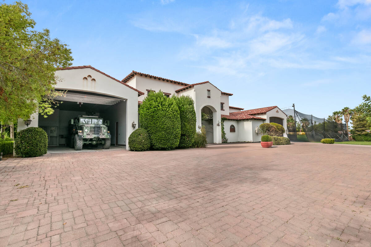 A Las Vegas mansion with a full-sized basketball court that works as a roller hockey rink, alon ...