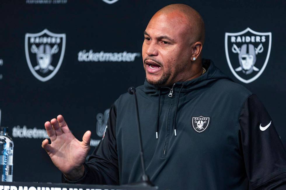 Raiders head coach Antonio Pierce answers a media question before practice at the Intermountain ...