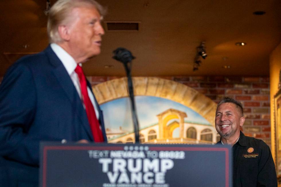 Republican presidential nominee former President Donald Trump, left, thanks Founder and Owner o ...