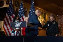 Republican presidential candidate and former President Donald Trump shakes hands with Il Toro E ...