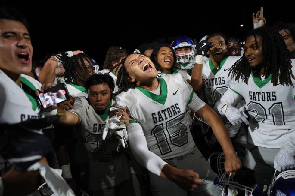 Green Valley, including quarterback Michael Lewis (15) celebrate their win during the second ha ...