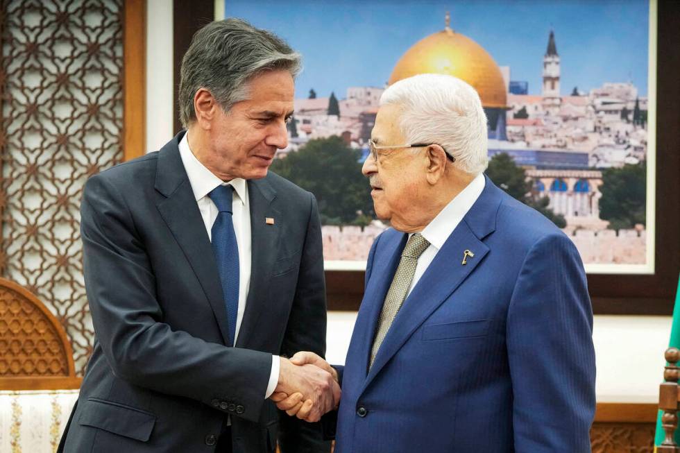 Secretary of State Antony Blinken, left, meets with Palestinian President Mahmoud Abbas in Rama ...