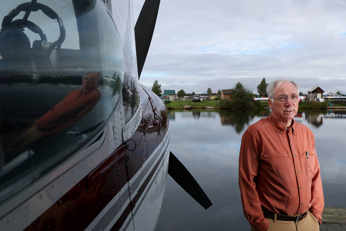 Art Mathias, a local businessman and insurance agent, poses for a portrait at the marina for hi ...