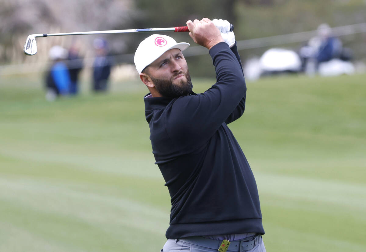 Jon Rahm of team Legion XIII watches his fairway shot during the first round of LIV Golf Las Ve ...