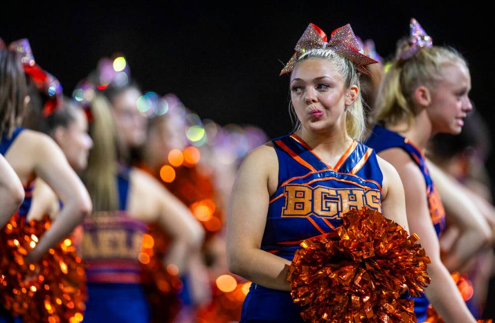 A Bishop Gorman cheerleader is a bit dismayed as Mater Dei dominates during the second half of ...