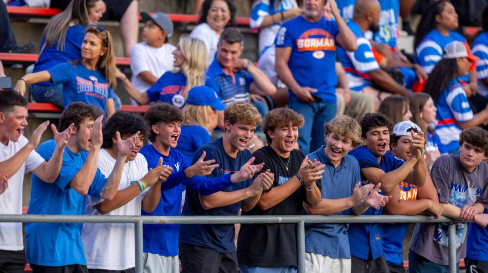 Bishop Gorman fans cheer as they face Mater Dei during the first half of their high school foot ...