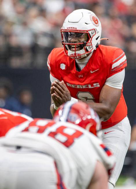 UNLV quarterback Hajj-Malik Williams (6) prepares to snap the ball during the college football ...