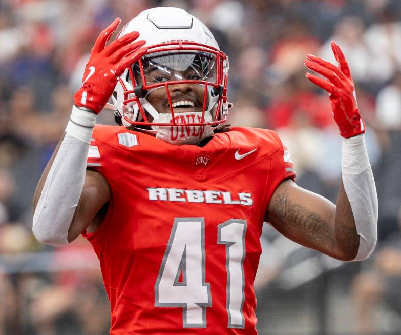 UNLV Rebels defensive back Rashod Tanner (41) pumps up the crowd after a punt during the colleg ...