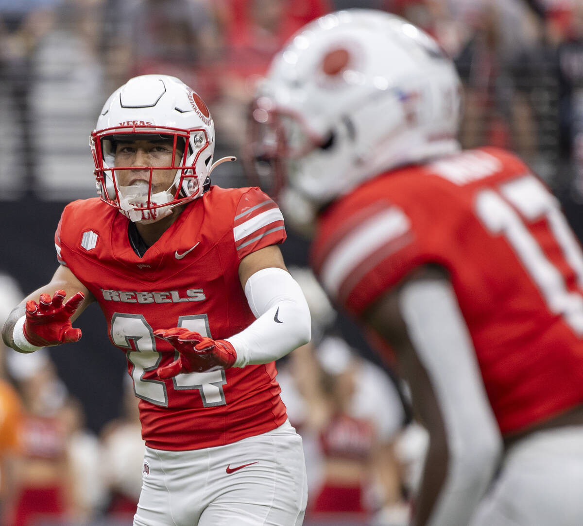 UNLV defensive back Kodi DeCambra (24) yells instructions to defensive back La'Vario Wiley (17) ...