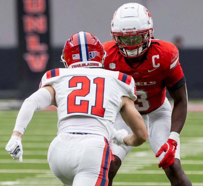 UNLV defensive back Johnathan Baldwin (3) guards Utah Tech wide receiver Tru Tanner (21) during ...