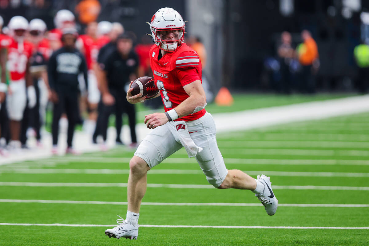 UNLV quarterback Matthew Sluka (3) scrambles with the ball during an NCAA football game between ...