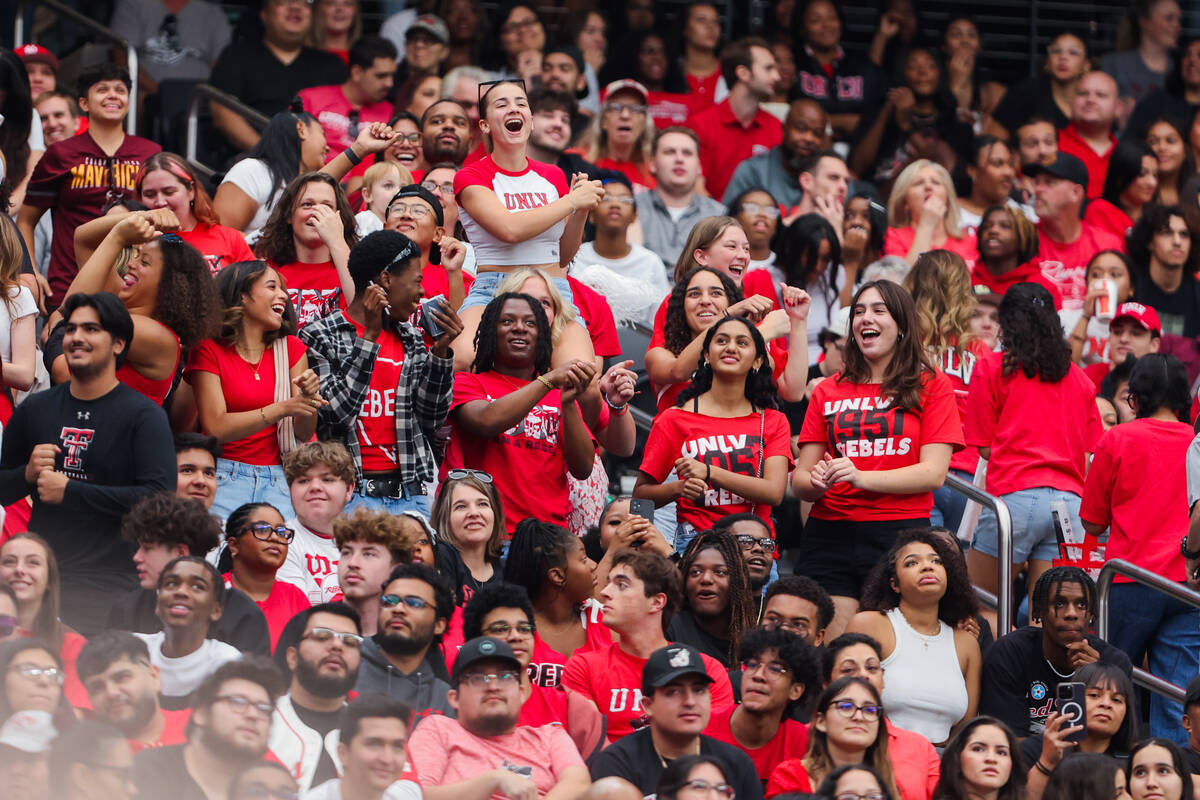 The UNLV student section dances during a time out at an NCAA football game between UNLV and Uta ...