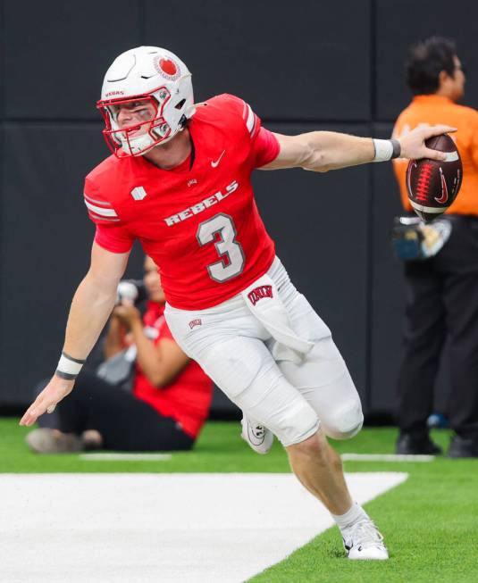 UNLV quarterback Matthew Sluka (3) celebrates a touchdown during an NCAA football game between ...