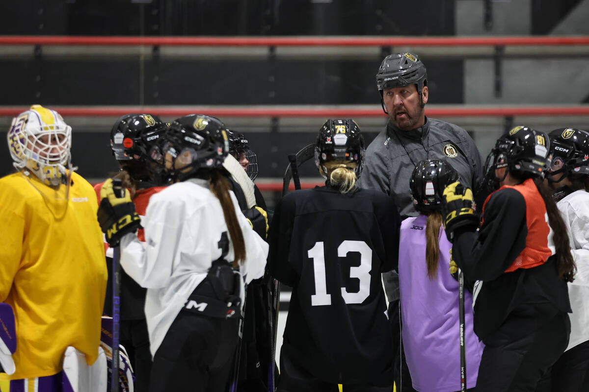 Vegas Jr. Golden Knights 14U Girls team head coach Gordie Mark speaks to his team during practi ...