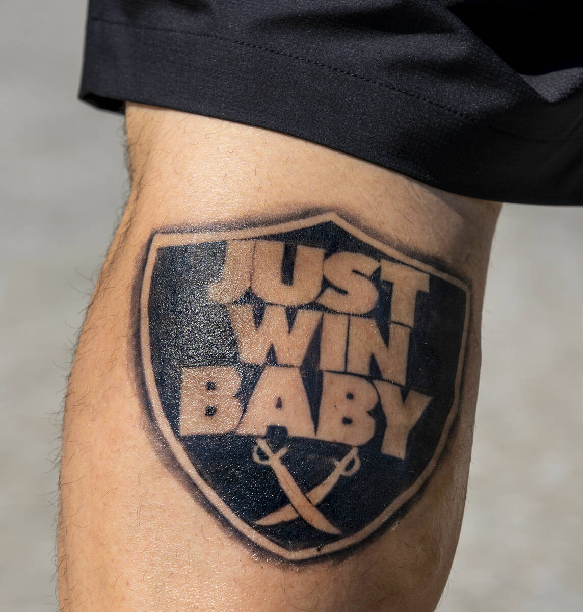 A fan sports Raiders tattoo on his calf before the Raiders face the Los Angeles Chargers in an ...