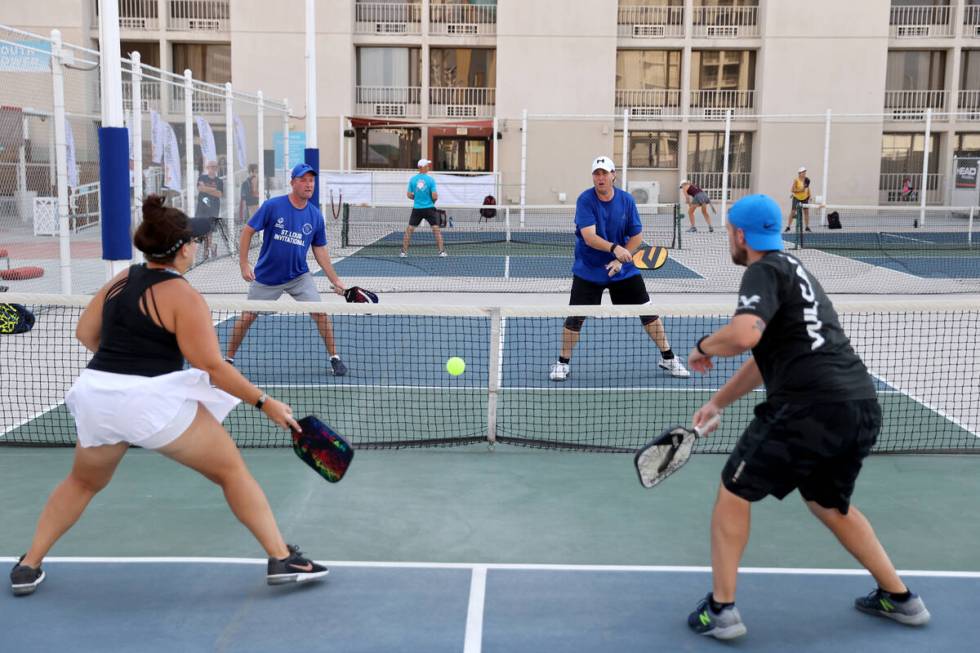 FILE--Pickleball players, from left, Jessica Hollern of Clermont, Fla., Dionne Hardin of Cadiz, ...