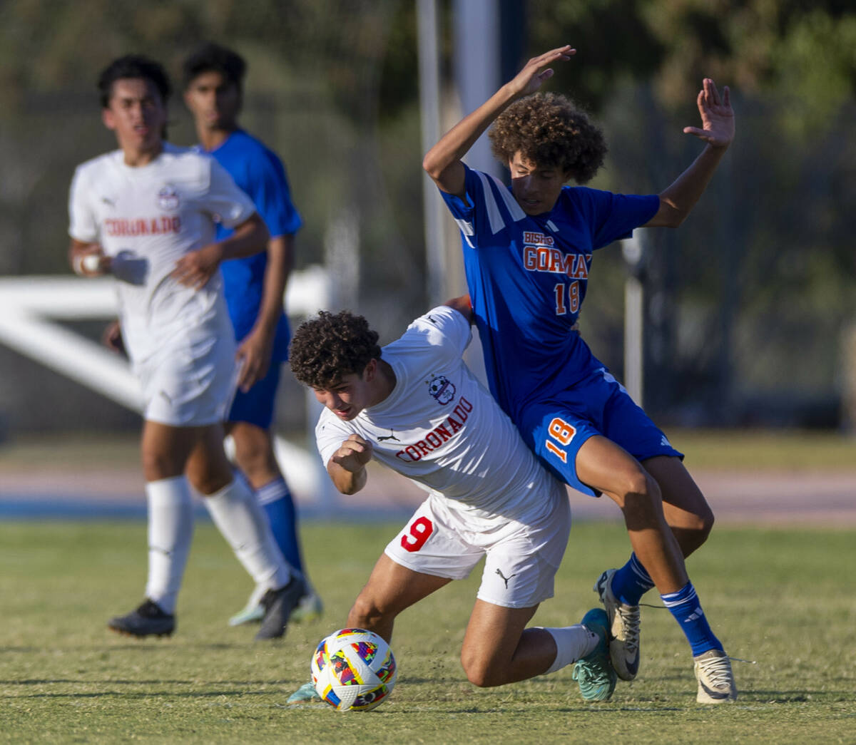 Bishop Gorma Coronado striker Dylan Flores (9) steals the ball from Bishop Gorman defender Eli ...