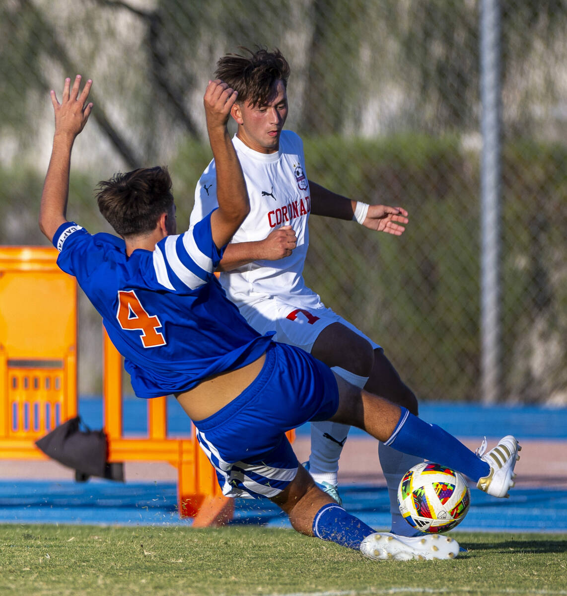 Bishop Gorman defender Massimiliano Musi (4) looks to take the ball from Coronado forward Austi ...