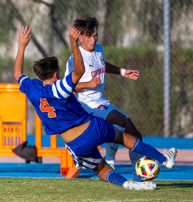 Bishop Gorman defender Massimiliano Musi (4) looks to take the ball from Coronado forward Austi ...