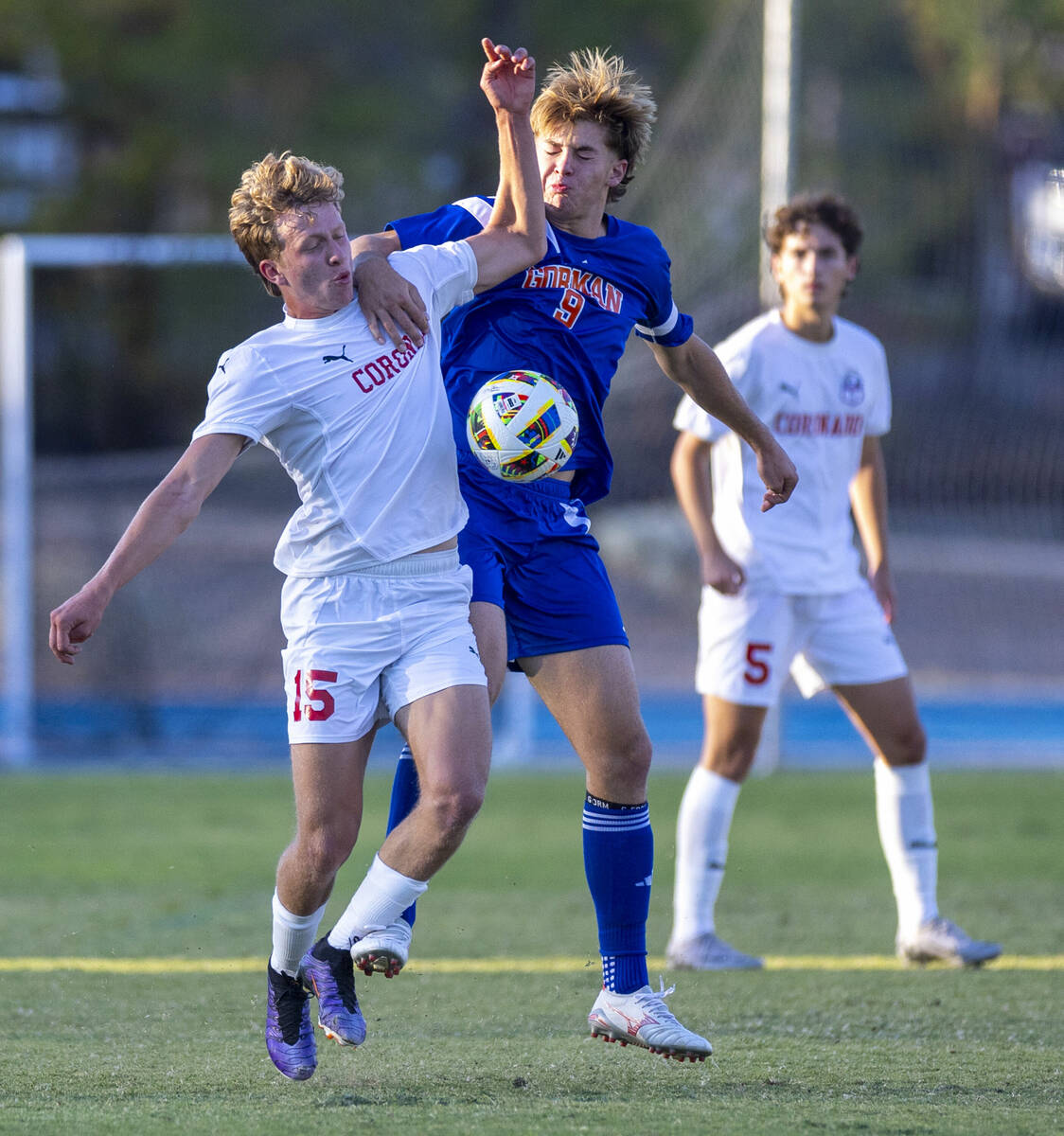 Bishop Gorman forward Chase Stewart (9) battles for the ball with Coronado defender Ben Aronow ...