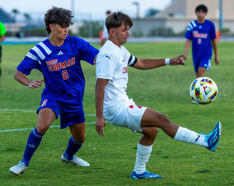 Coronado forward Austin Kiernan (7) controls the ball against Bishop Gorman defender Rocco Mars ...