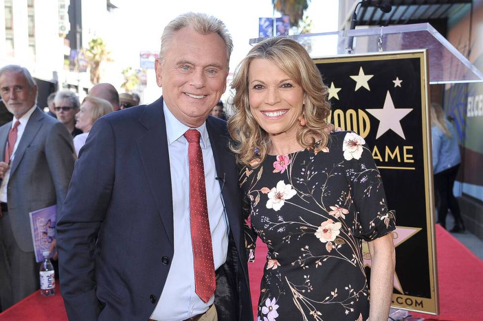 Pat Sajak, left, and Vanna White, from "Wheel of Fortune," attend a ceremony honoring Harry Fri ...