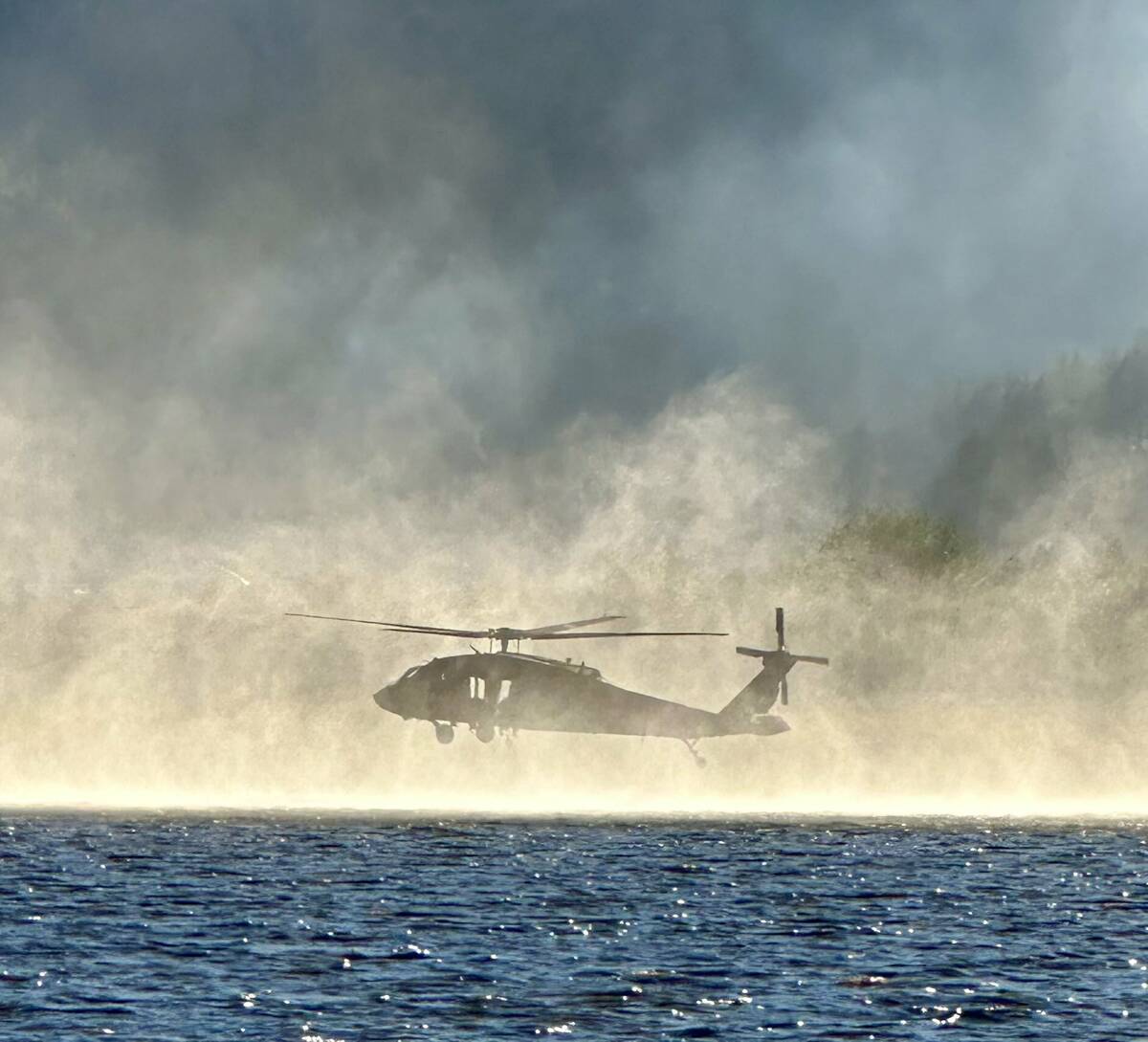 A firefighting helicopter is seen in a provided photo Tuesday, Sept. 10, 2024. (Nevada National ...