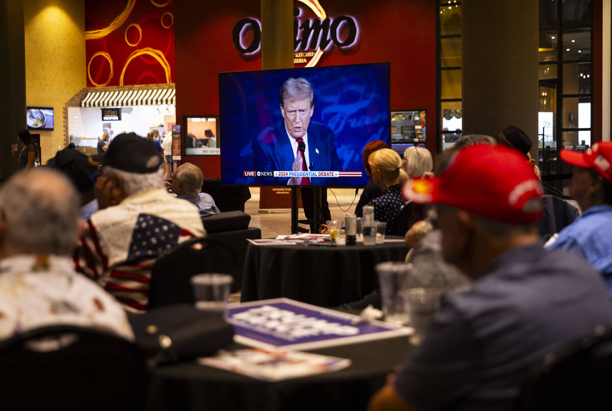 Supporters watch as Republican presidential nominee former President Donald Trump speaks during ...