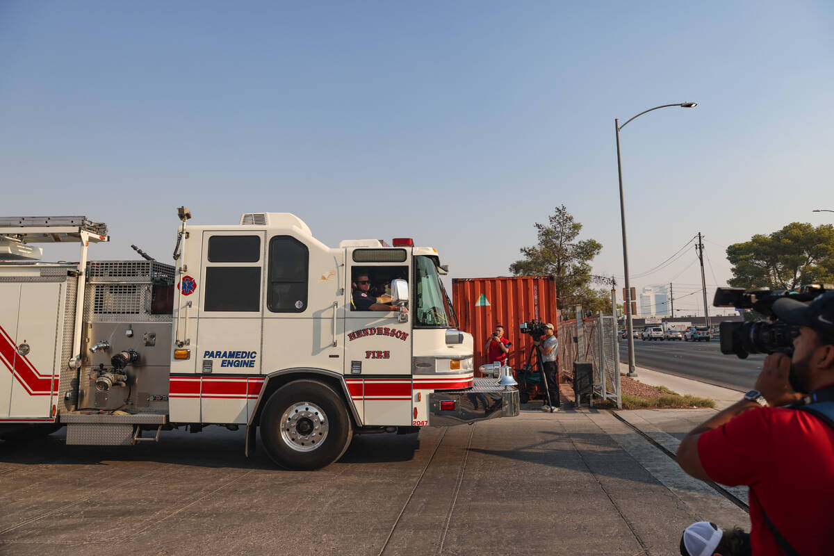 Firefighters depart to the Davis Fire from the Clark County Fire Department training center in ...