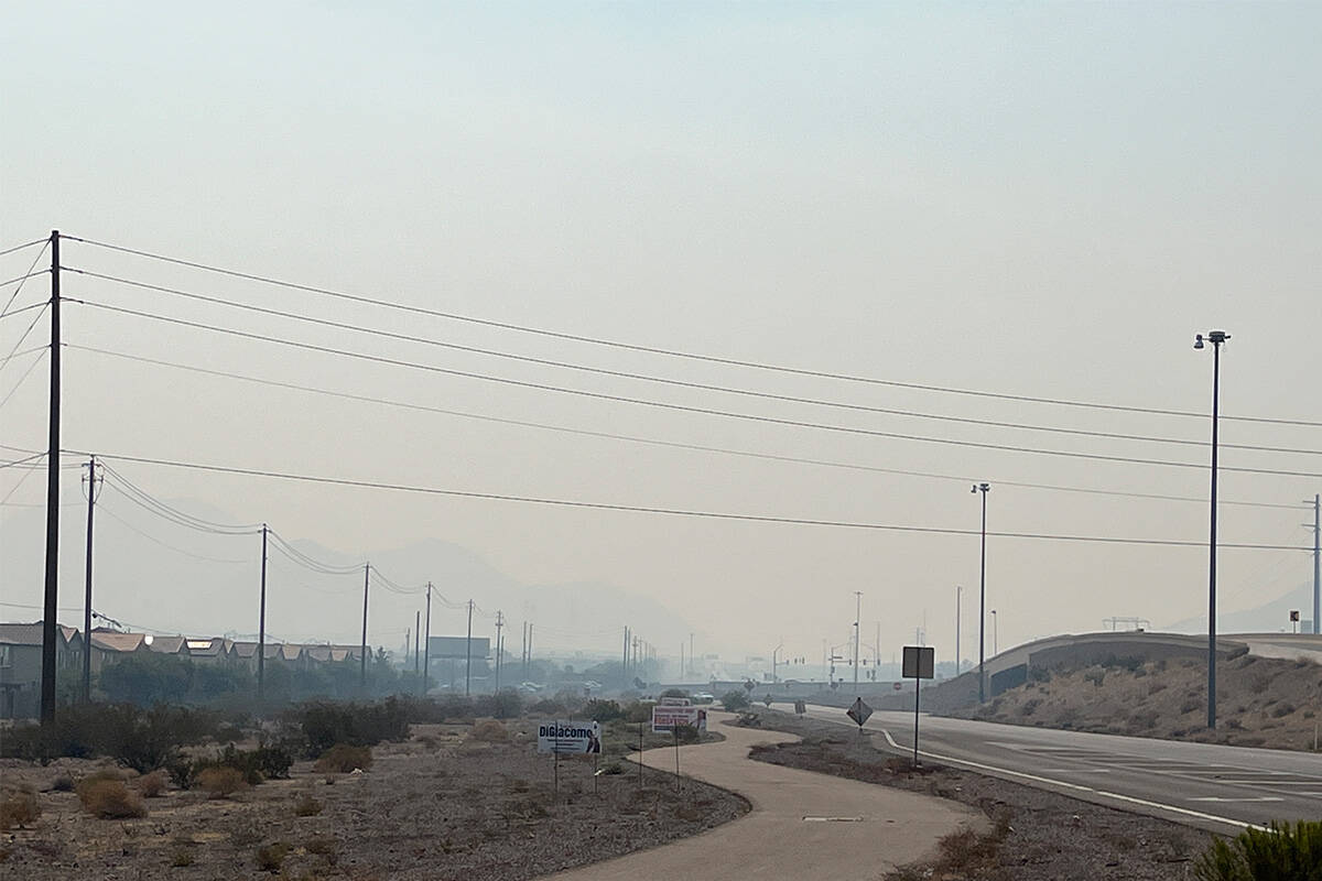 Smoke from wildfires burning in Southern California is seen in the skies above Henderson near B ...