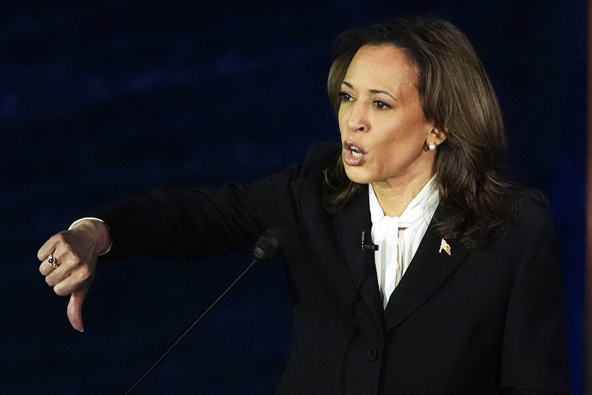 Democratic presidential nominee Vice President Kamala Harris gestures as she speaks during a pr ...