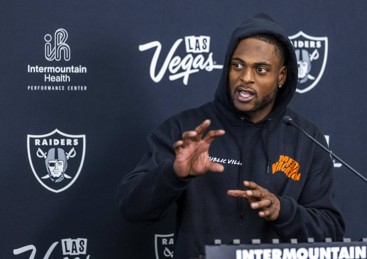 Raiders wide receiver Davante Adams (17) answers to a question during a media interview at the ...