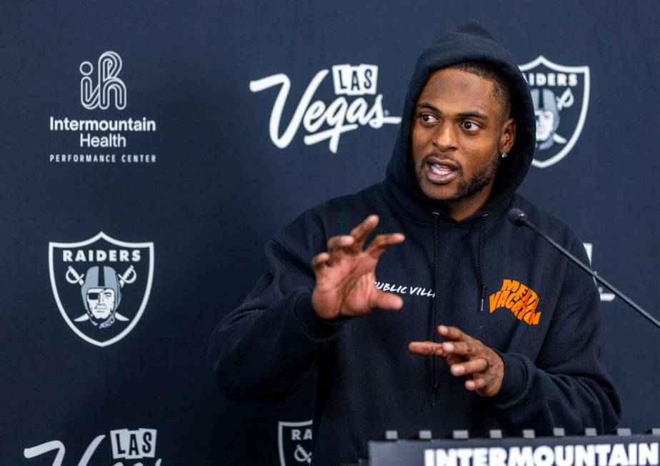 Raiders wide receiver Davante Adams (17) answers to a question during a media interview at the ...